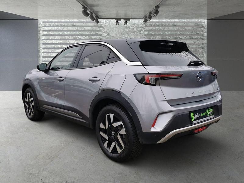 Gebraucht Opel Mokka-e Elegance 100 kW (136 PS) 2022 Kontrast grau/quarz silber SUV