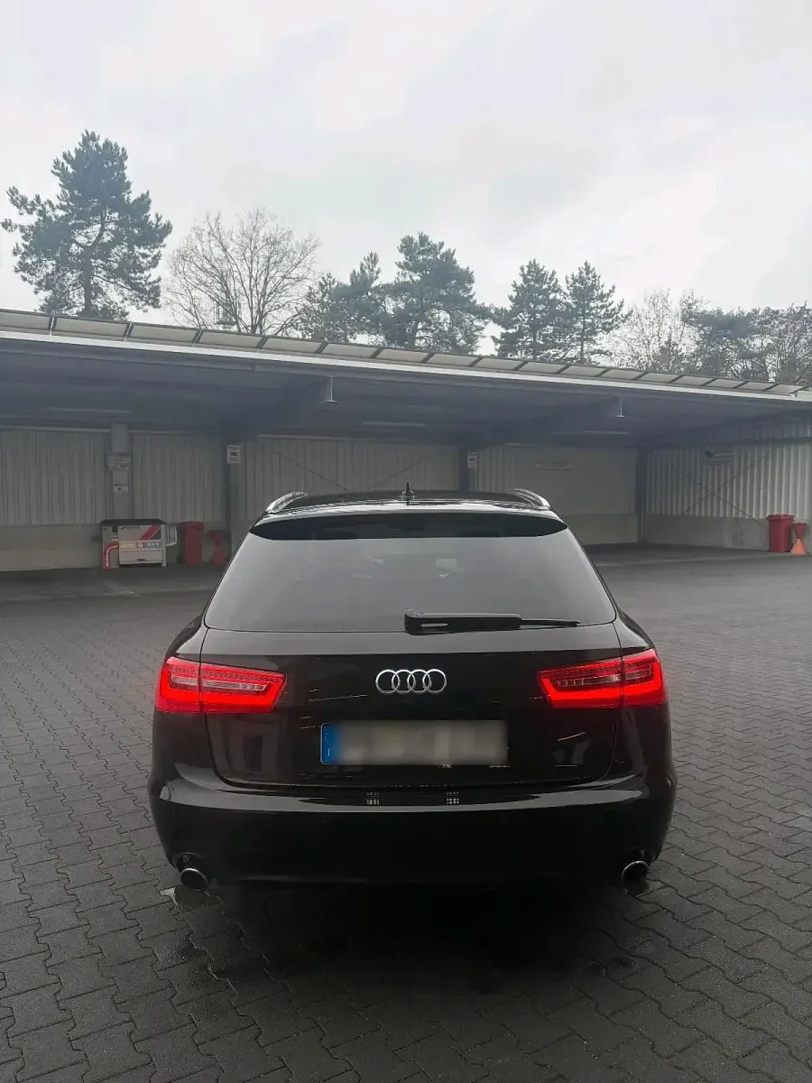 Używany Audi A6 190 KM (139 kW) 2014 Czarny Kombi