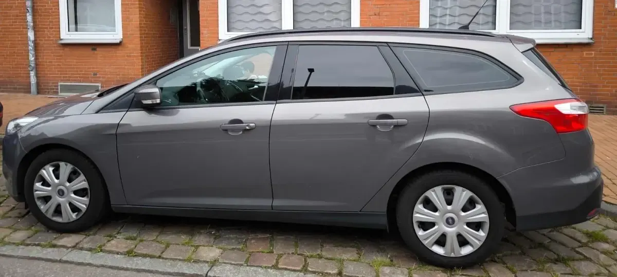 Gebraucht Ford Focus 101 PS (74 kW) 2014 Braun Kombi