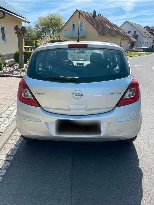 Second-hand Opel Corsa 75 CP (55 kW) 2009 Argintiu Hatchback