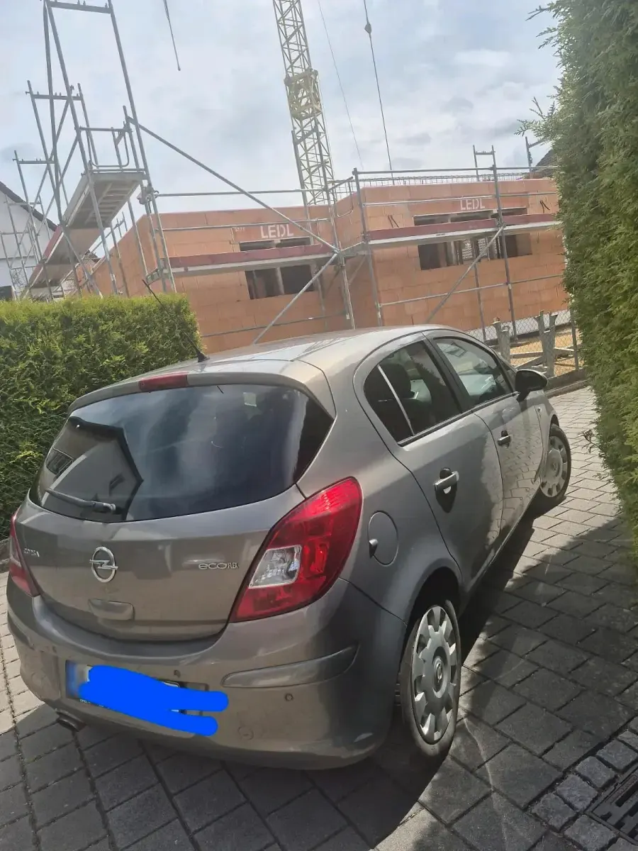 Używany Opel Corsa 95 KM (69 kW) 2012 Szary Hatchback