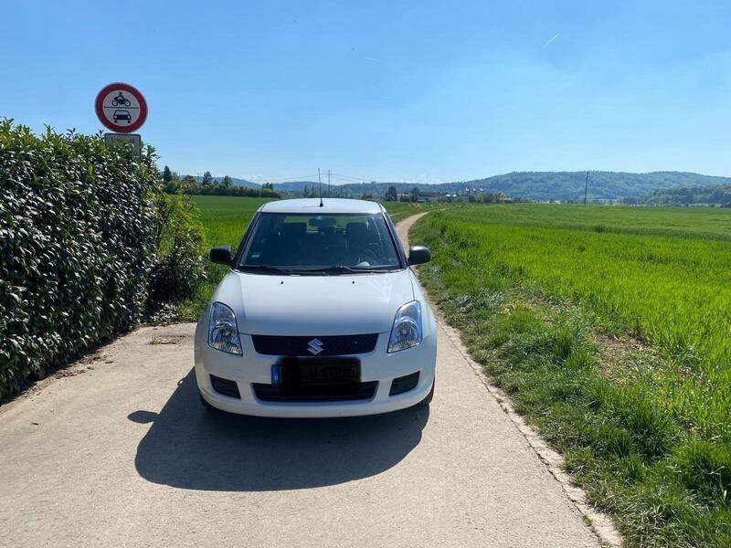 Weiß Gebraucht 2009 Suzuki Swift Kleinwagen | 1.950 € - Bild 1/4