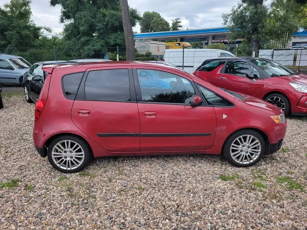 Gebraucht Mitsubishi Colt Inform 95 PS (69 kW) 2009 Rot Kleinwagen