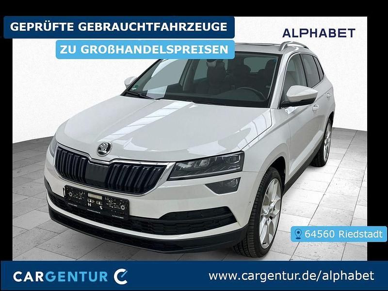Candyweiss uni Gebraucht 2020 Skoda Karoq Style SUV | 18.307 € (Guter Preis) - Bild 1/2