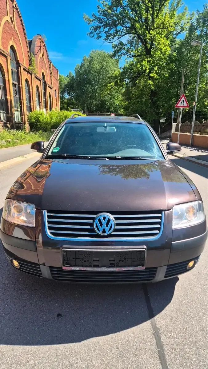 Używany VW Passat 150 KM (110 kW) 2005 Purpurowy Kombi