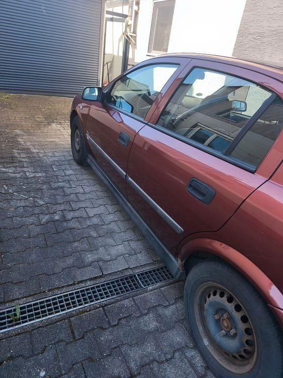 Second-hand Opel Astra 84 CP (61 kW) 2001 Roșu Berlinǎ