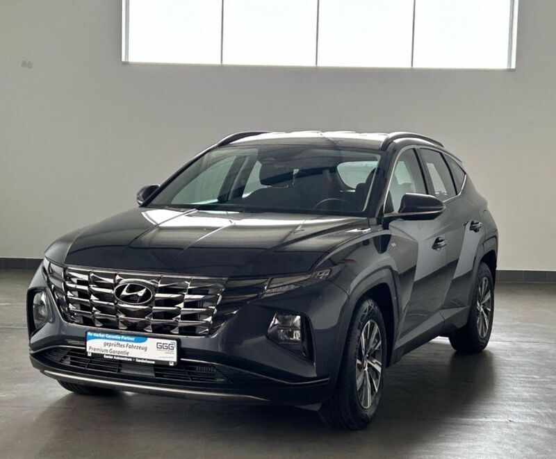 Grau Gebraucht 2021 Hyundai Tucson SUV | 24.690 € (Fairer Preis) - Bild 1/3