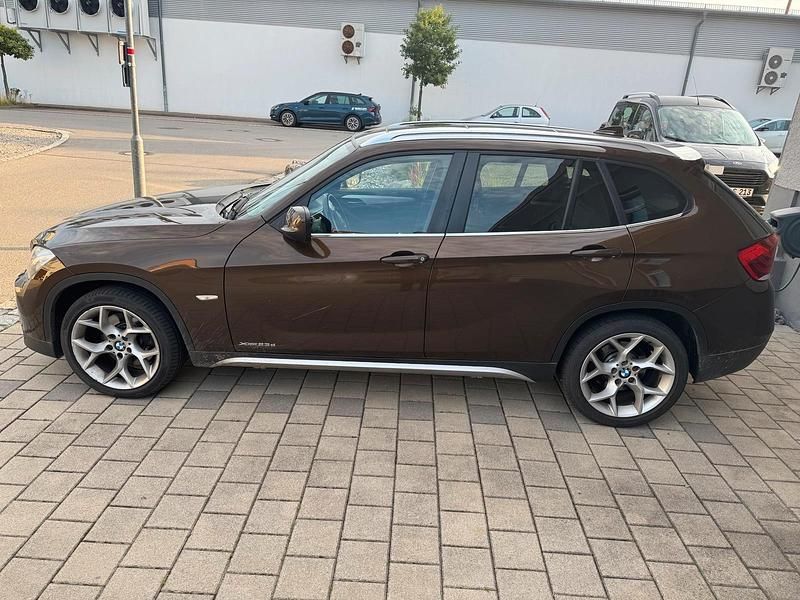 Braun Gebraucht 2010 BMW X1 SUV | 10.000 € - Bild 1/4