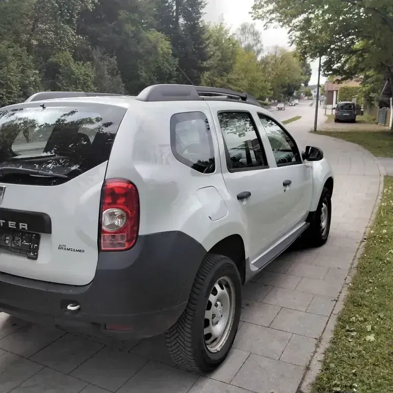 Używany Dacia Duster Lauréate 105 KM (77 kW) 2013 Biały SUV