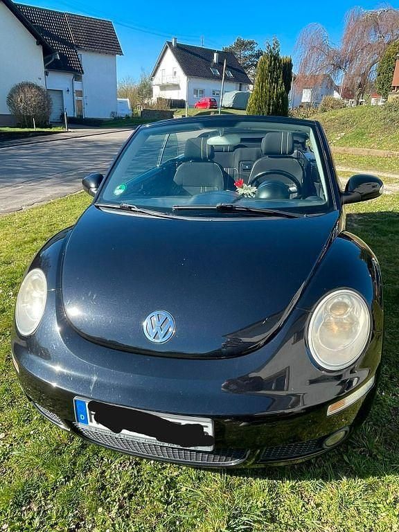 Gebraucht VW New Beetle Freestyle 105 PS (77 kW) 2010 Schwarz Kleinwagen