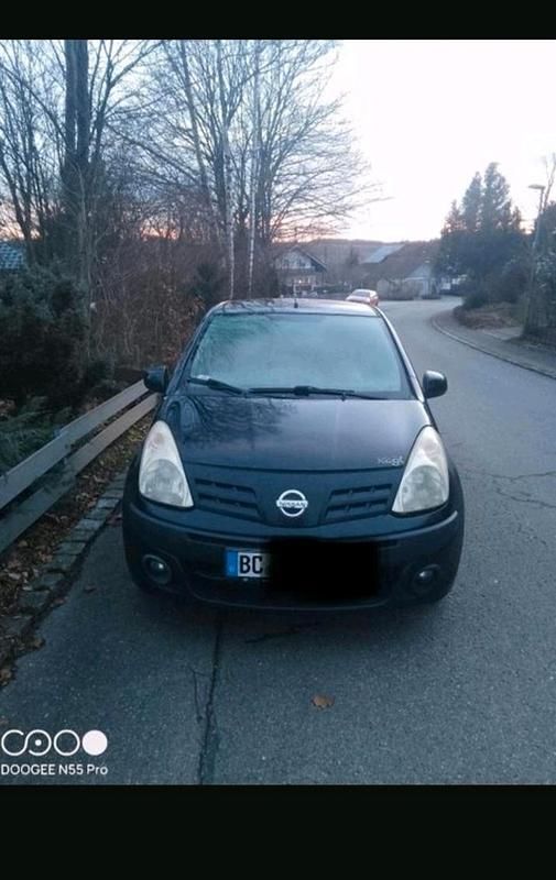 Gebraucht Nissan Pixo 68 PS (50 kW) 2010 Schwarz Kleinwagen