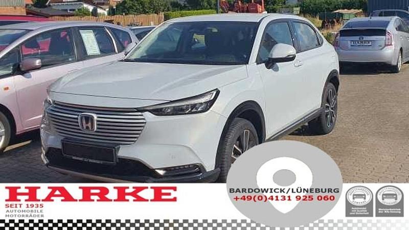 Premium sunlight whi nh902p (metallic) Gebraucht 2023 Honda HR-V Advance SUV | 28.900 € (Etwas zu teuer) - Bild 1/4