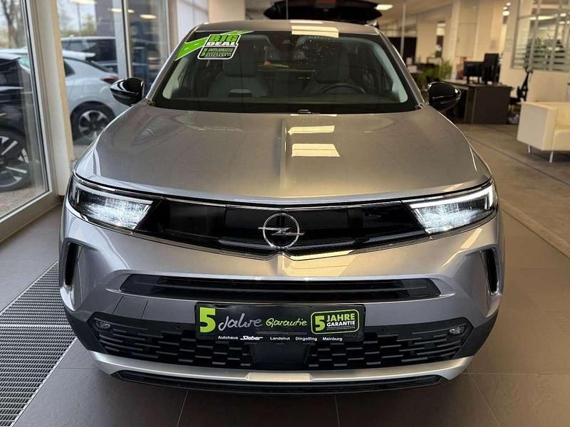 Gebraucht Opel Mokka Elegance 101 PS (74 kW) 2023 Kontrast grau/quarz silber SUV