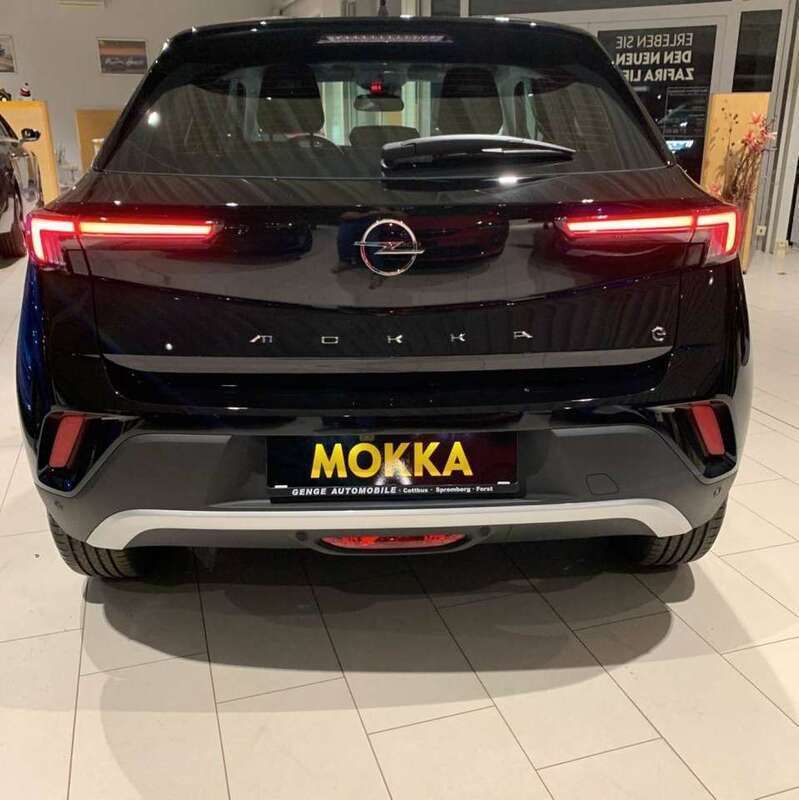 Gebraucht Opel Mokka-e Elegance 100 kW (136 PS) 2023 Karbon schwarz (metallic) SUV