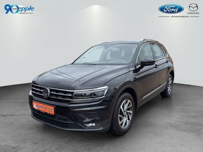 Deep black pearlescent (metallic) Gebraucht 2018 VW Tiguan Sound SUV | 24.990 € (Fairer Preis) - Bild 1/4