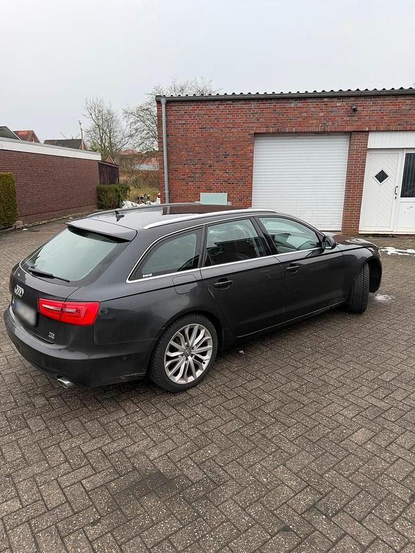 Używany Audi A6 201 KM (147 kW) 2014 Czarny Kombi