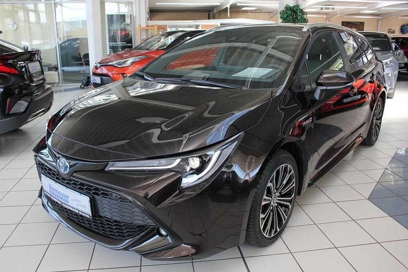 Phantombraun metallic Gebraucht 2022 Toyota Corolla Team Kombi | 24.980 € (Fairer Preis) - Bild 1/4