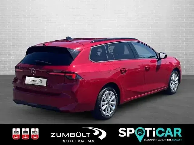 Gebraucht Opel Astra Enjoy 110 PS (80 kW) 2024 Lackierung peperoncino red/typ Kombi