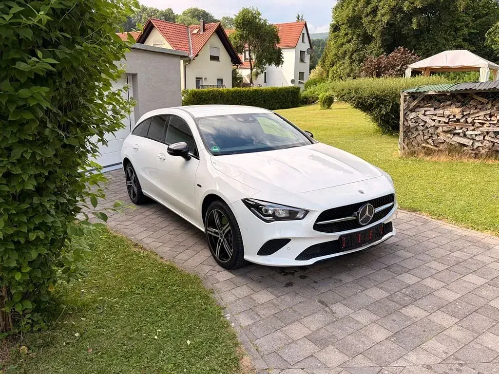 Gebraucht Mercedes CLA250e 218 PS (160 kW) 2021 Weiß Coupé