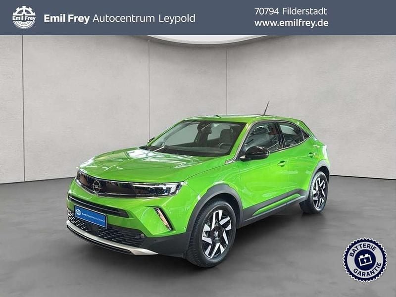 Grün Gebraucht 2023 Opel Mokka-e Elegance SUV | 20.890 € (Fairer Preis) - Bild 1/4