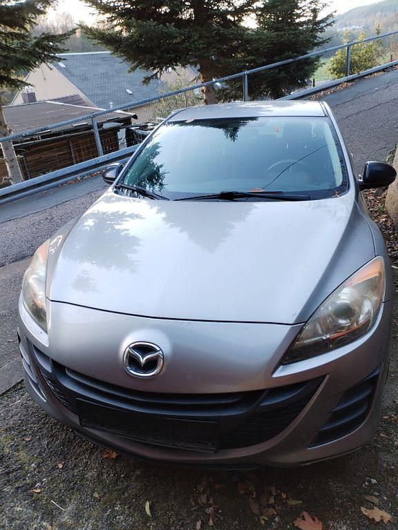 Grau Gebraucht 2009 Mazda 3 Center-Line Limousine | 1.499 € (Superpreis) - Bild 1/4