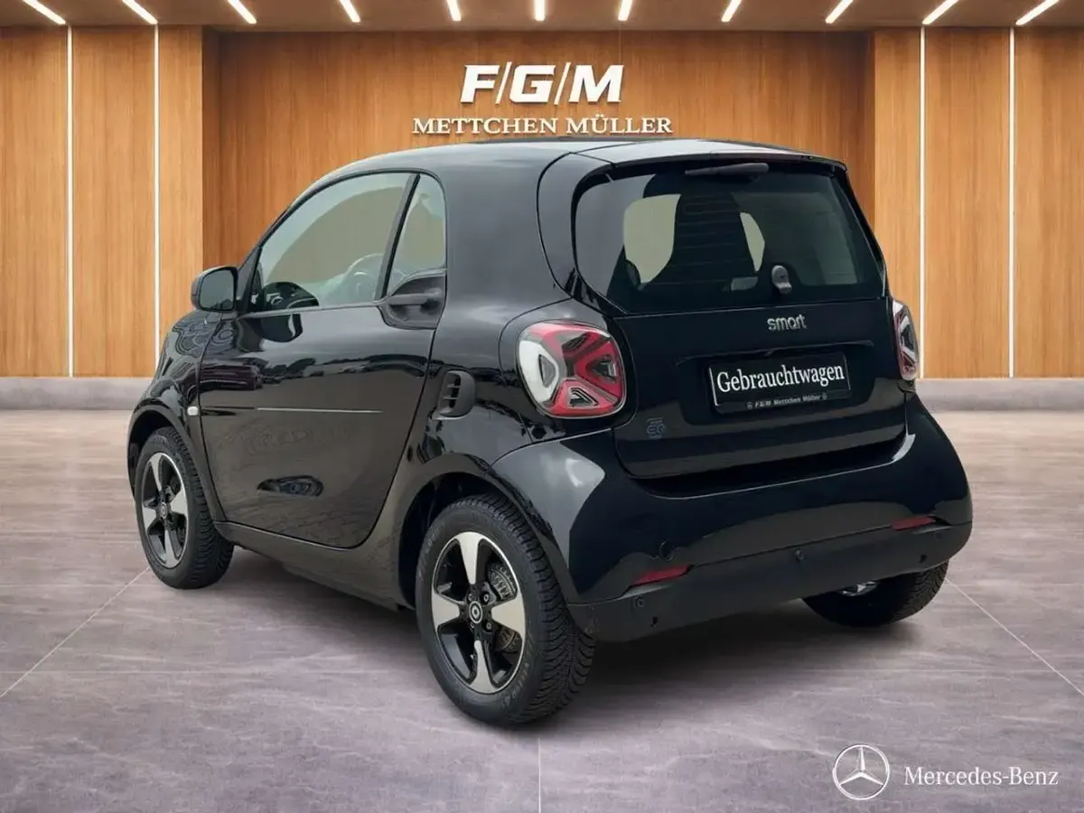Gebraucht Smart ForTwo Coupé 60 kW (82 PS) 2024 Bodypanels in black Kleinwagen