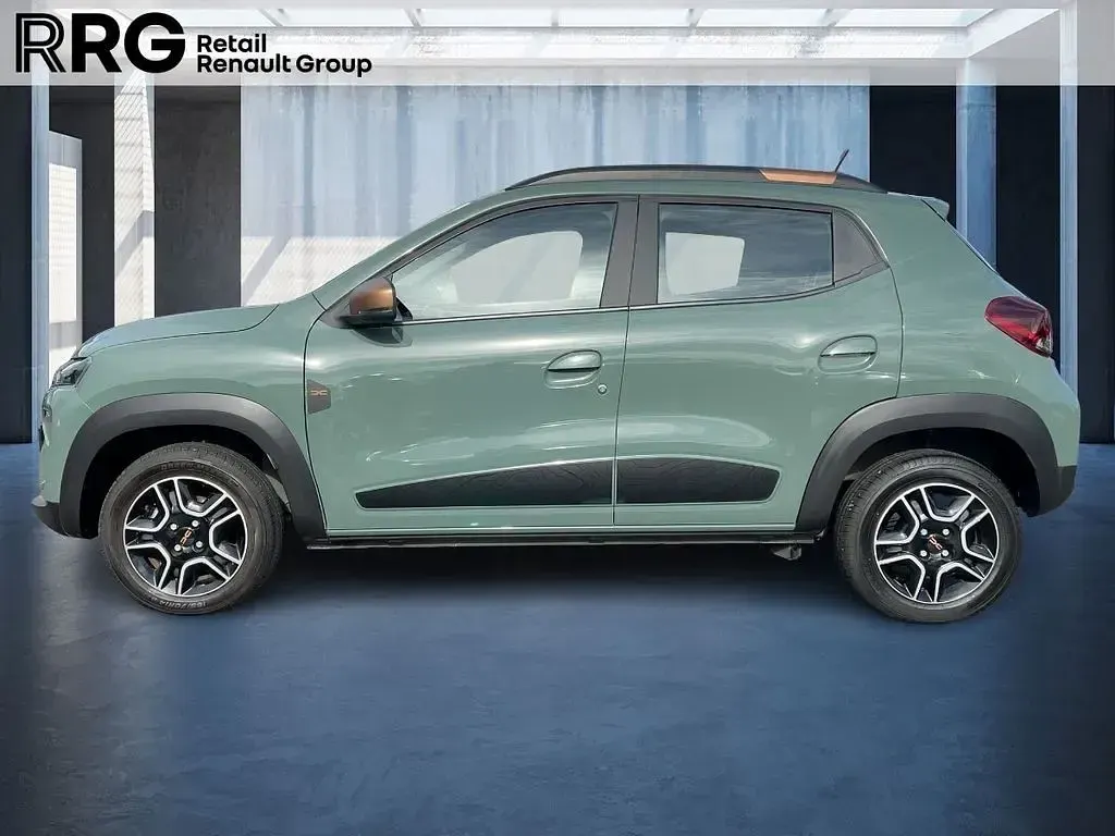 Gebraucht Dacia Spring Extreme 47 kW (65 PS) 2024 Flechtengrün Kleinwagen