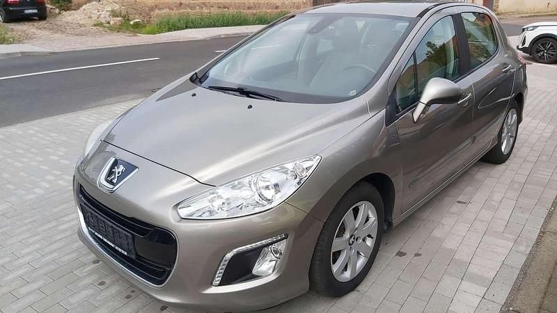 Grau Gebraucht 2012 Peugeot 308 Active Kleinwagen | 5.390 € (Fairer Preis) - Bild 1/4
