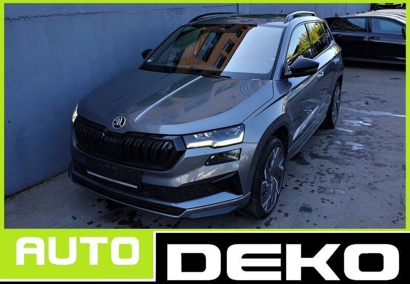Grau Gebraucht 2022 Skoda Karoq SportLine SUV | 31.870 € (Fairer Preis) - Bild 1/4