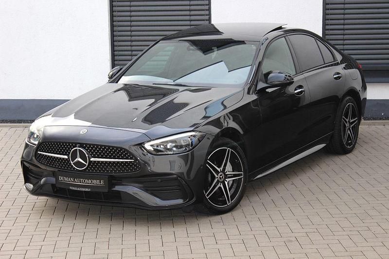 Graphitgrau metallic Gebraucht 2022 Mercedes C300e AMG Limousine | 35.900 € - Bild 1/4