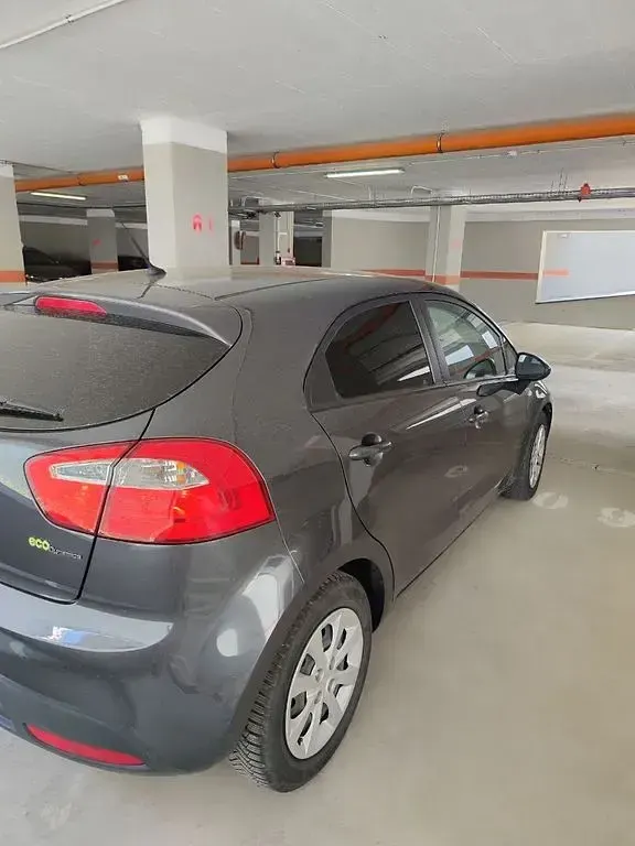 Gebraucht Kia Rio 75 PS (55 kW) 2014 Grau Limousine