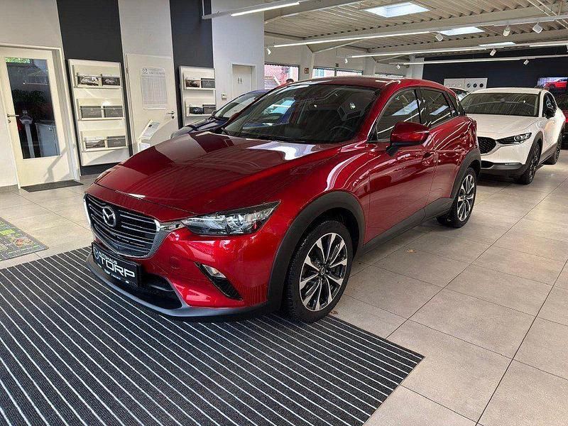 Magmarot metallic Gebraucht 2021 Mazda CX-3 Ad'Vantage SUV | 19.990 € (Etwas zu teuer) - Bild 1/4