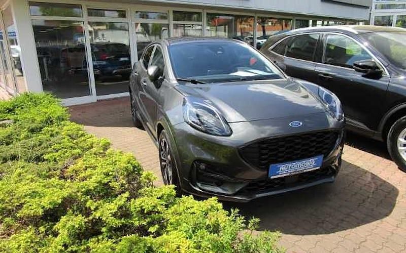 Grau Gebraucht 2024 Ford Puma Gen-E ST-Line SUV | 26.490 € - Bild 1/4