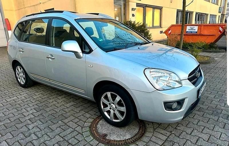 Silber Gebraucht 2007 Kia Carens 2 Van / Kleinbus | 1.555 € (Guter Preis) - Bild 1/4