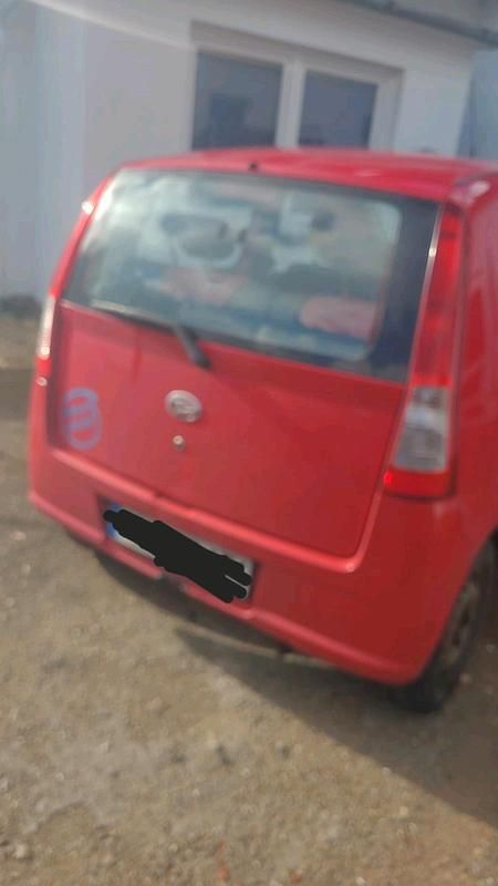 Gebraucht Daihatsu Cuore 58 PS (42 kW) 2006 Rot Kleinwagen