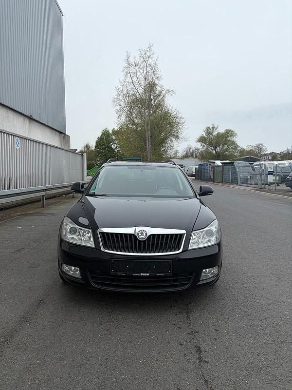 Second-hand Skoda Octavia 105 CP (77 kW) 2012 Negru Break