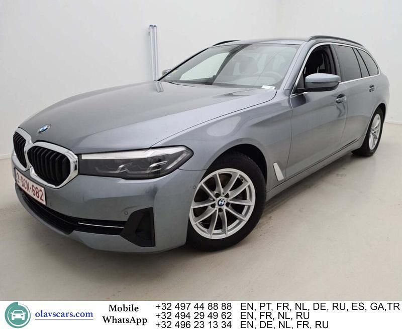Grau Gebraucht 2021 BMW 518 Sport Line Limousine | 22.022 € (Guter Preis) - Bild 1/4