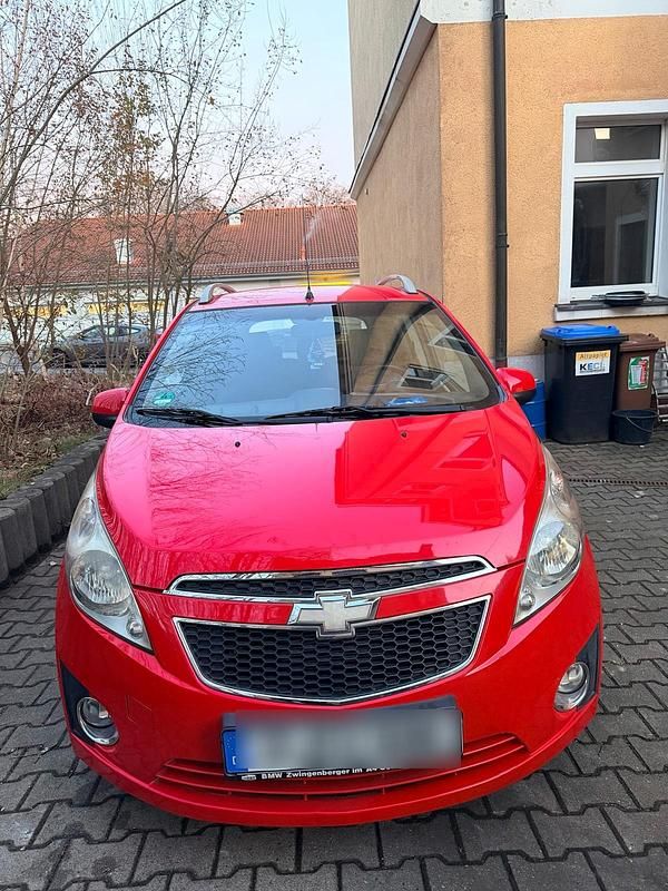 Rot Gebraucht 2010 Chevrolet Spark Kleinwagen | 2.000 € - Bild 1/4