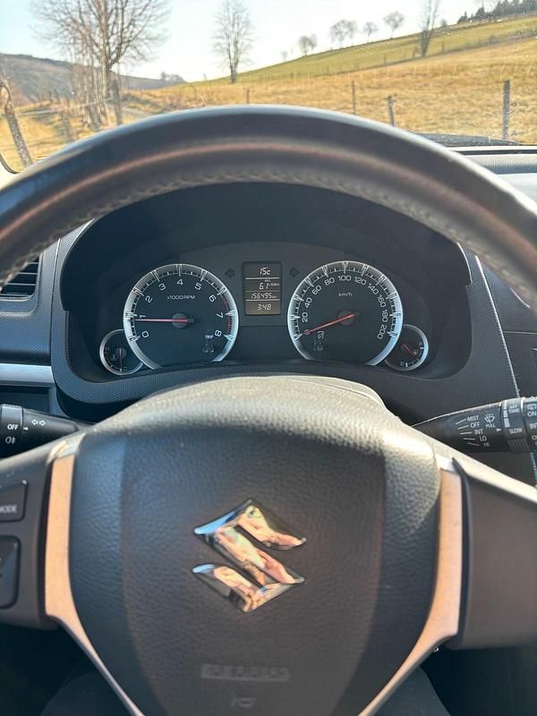 Gebraucht Suzuki Swift 94 PS (69 kW) 2013 Rot Kleinwagen