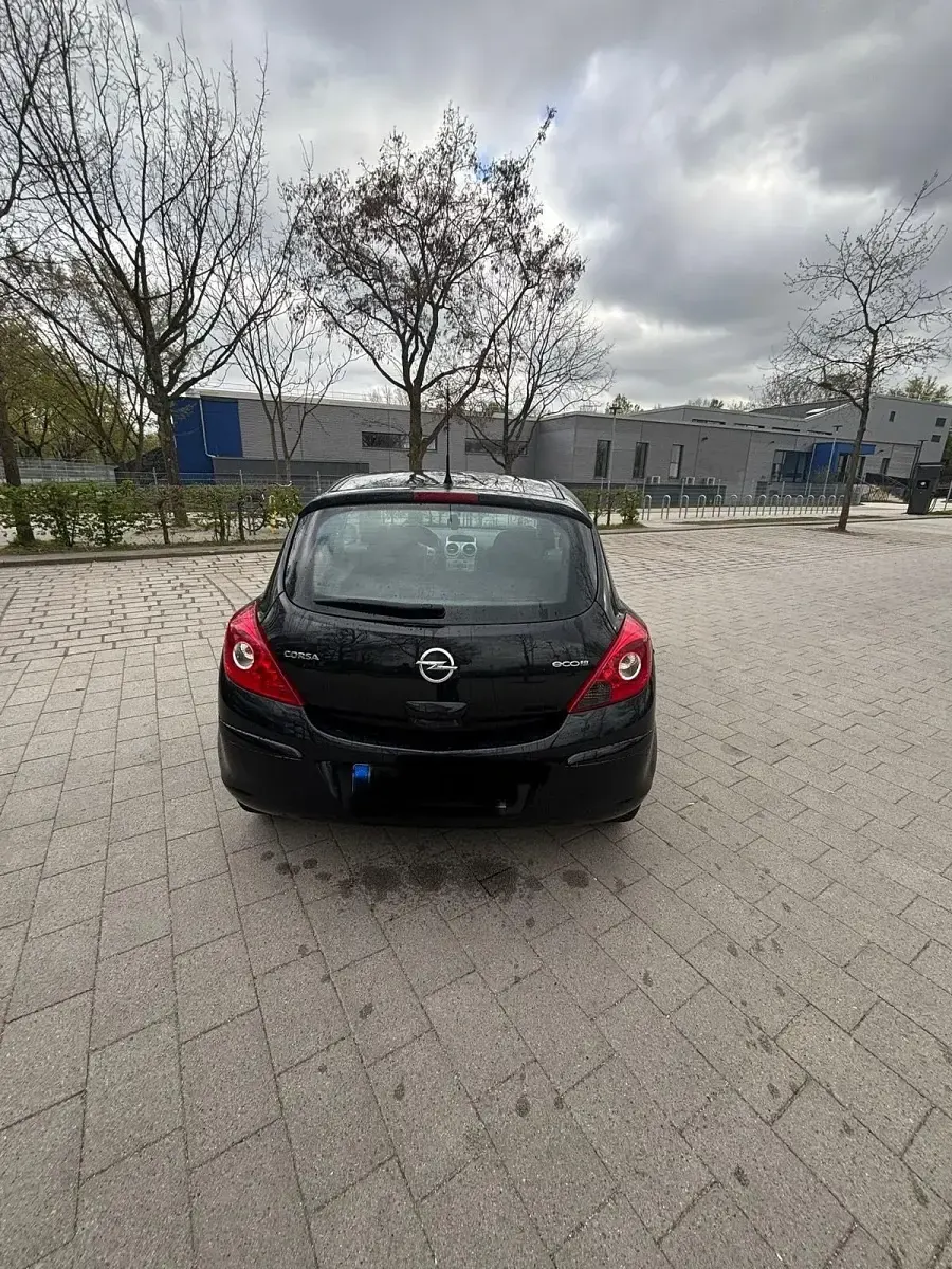 Używany Opel Corsa 69 KM (50 kW) 2013 Czarny Hatchback