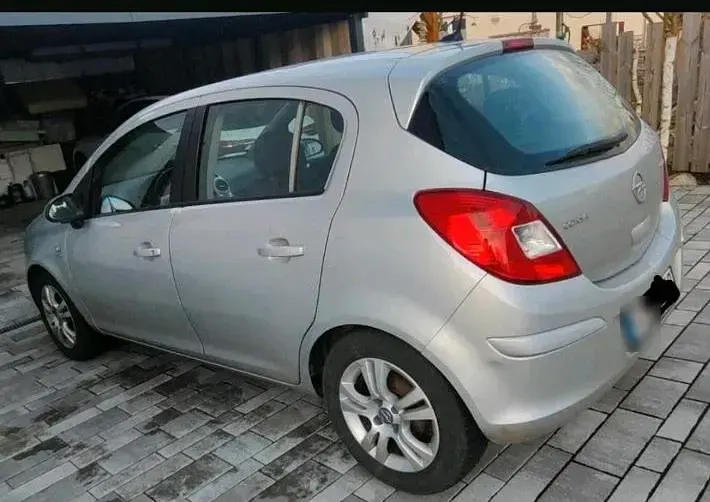 Gebraucht Opel Corsa Active 95 PS (69 kW) 2013 Silber Kleinwagen
