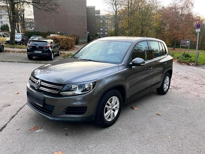 Grau Gebraucht 2014 VW Tiguan SUV | 7.950 € (Superpreis) - Bild 1/4