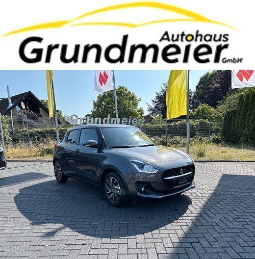 Grau Gebraucht 2022 Suzuki Swift Comfort+ Limousine | 13.459 € (Fairer Preis) - Bild 1/4