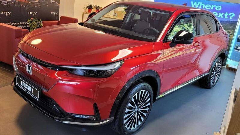 Vermilion rot pearl Neu 2024 Honda e:Ny1 SUV | 31.470 € (Superpreis) - Bild 1/4
