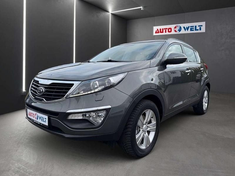 Dark phoenix Gebraucht 2012 Kia Sportage Vision SUV | 9.990 € (Fairer Preis) - Bild 1/4