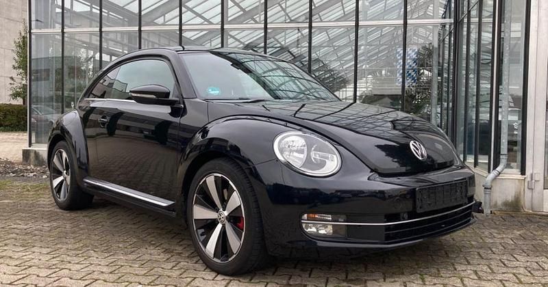 Deep black perleffekt Gebraucht 2012 VW Beetle Sportline Coupé | 12.380 € (Fairer Preis) - Bild 1/4