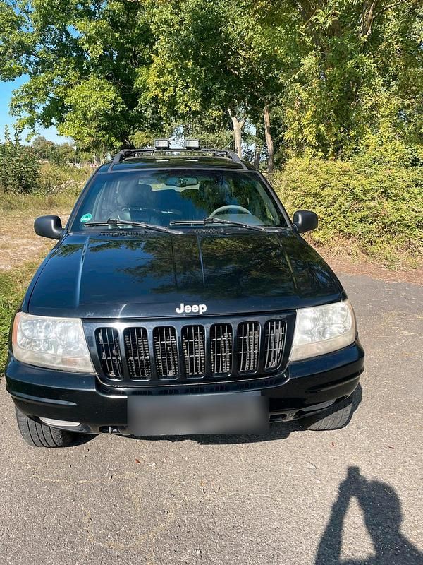 Schwarz Gebraucht 1999 Jeep Grand Cherokee SUV | 3.200 € (Fairer Preis) - Bild 1/4