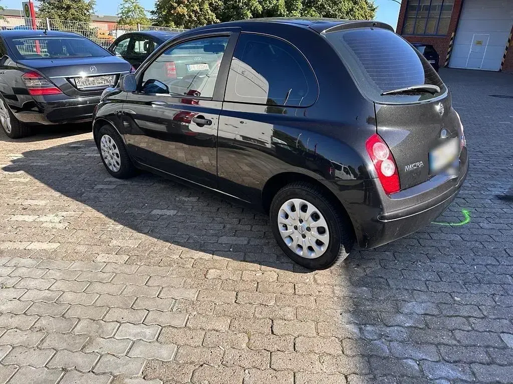 Gebraucht Nissan Micra 65 PS (47 kW) 2009 Schwarz Kleinwagen