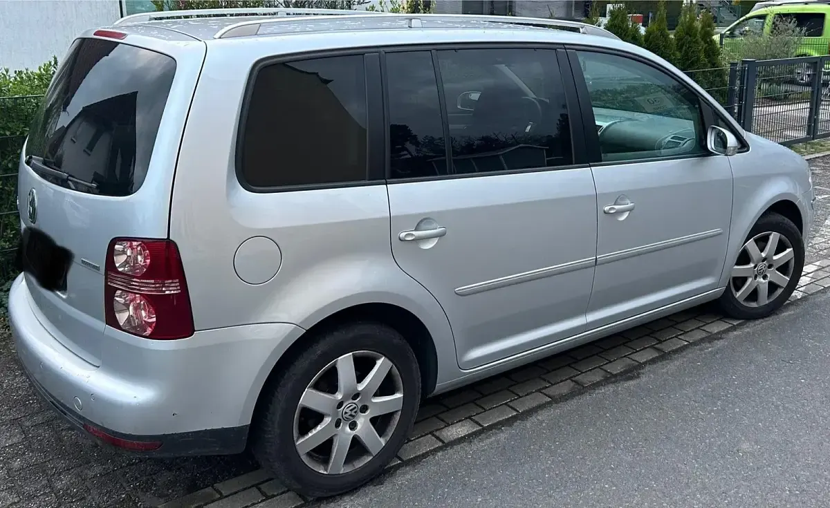 Używany VW Touran Pro 109 KM (80 kW) 2007 Srebrny Minivan