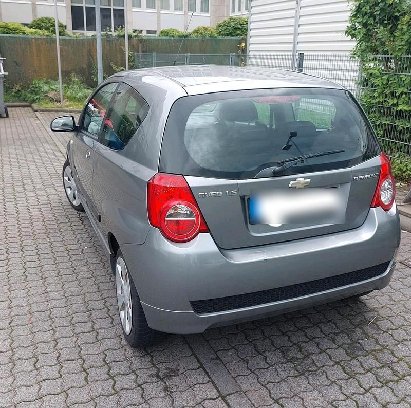Grau Gebraucht 2011 Chevrolet Aveo LS Kleinwagen | 1.899 € - Bild 1/4
